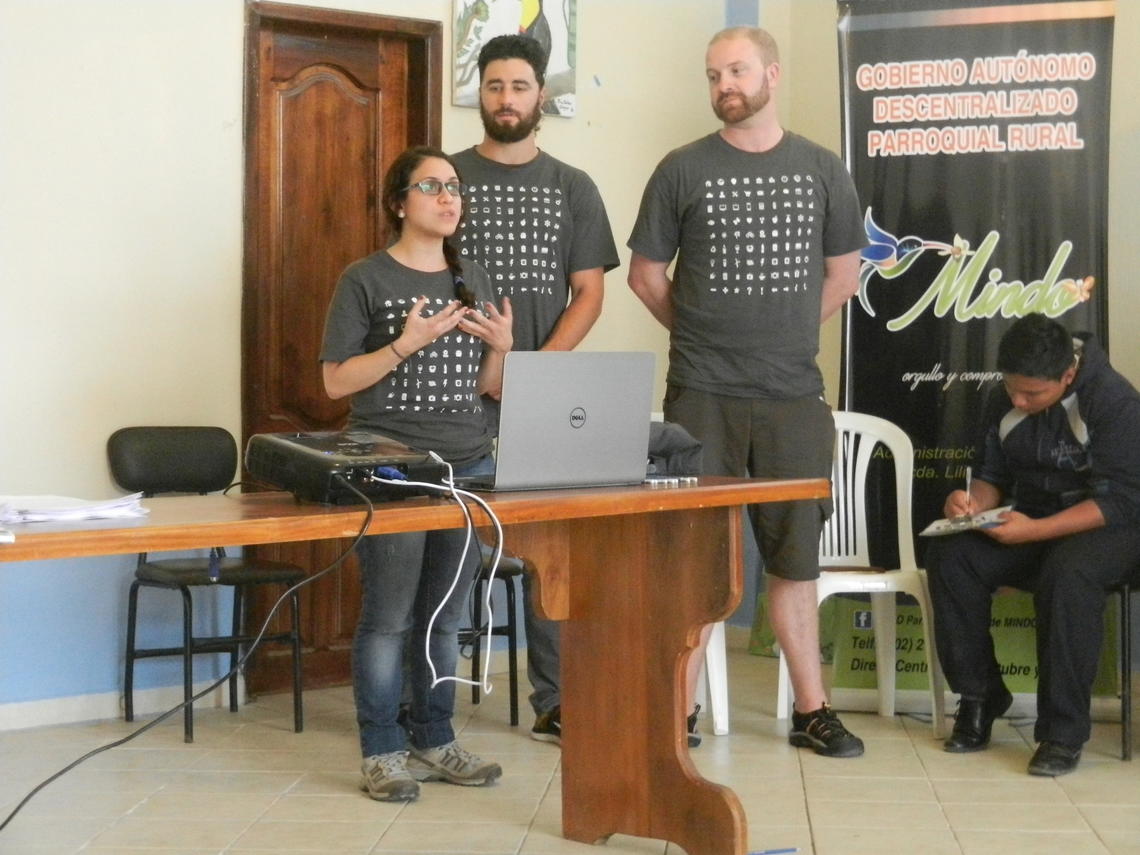 Students Margarita Meza, Nic Ritchie, and Jeff Coombs deliver a sustainability workshop in in Mindo, Ecuador. 