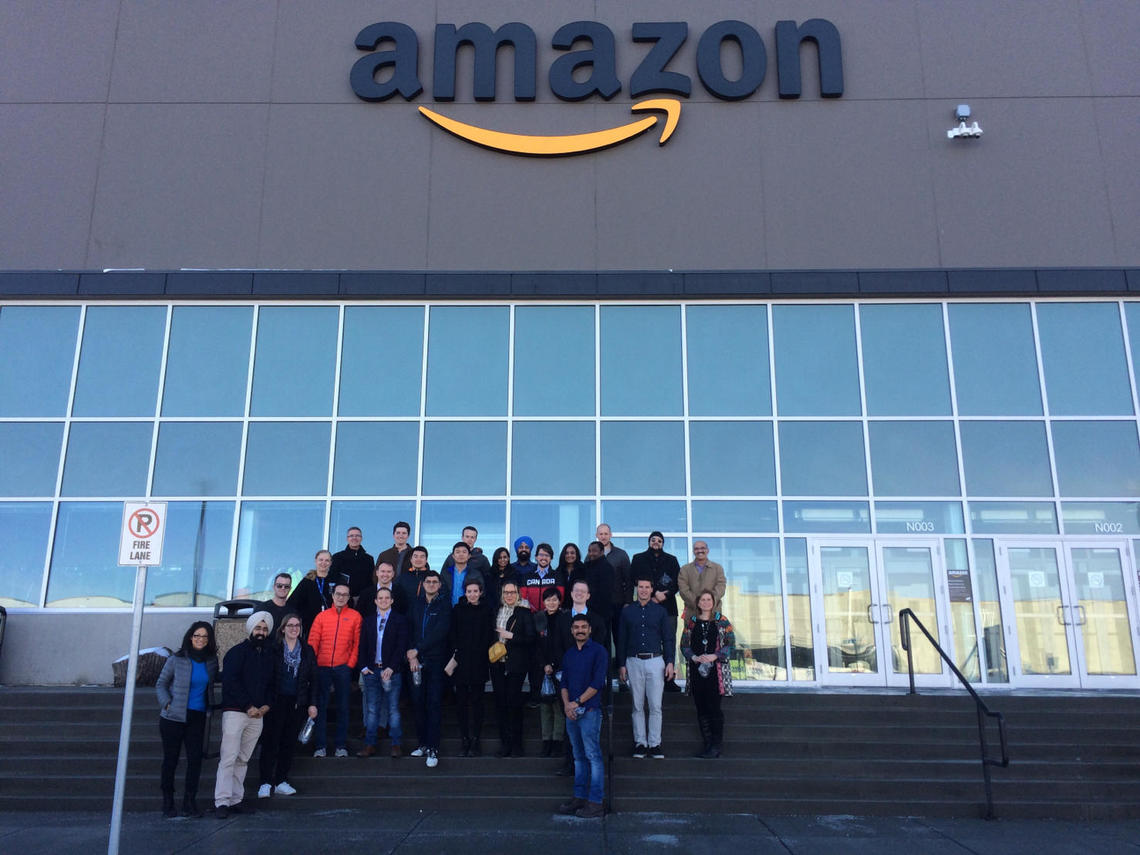 A group of 25 MBA students from the University of Calgary toured the Amazon fulfillment centre, which opened in 2017 near Calgary.