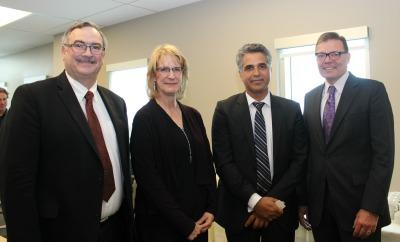 From left, Jon Meddings, dean, Cumming School of Medicine; Dianne Tapp, dean, Faculty of Nursing, Irfan Sabir, Alberta minister of Human Services; and Richard Sigurdson, dean, Faculty of Arts. 