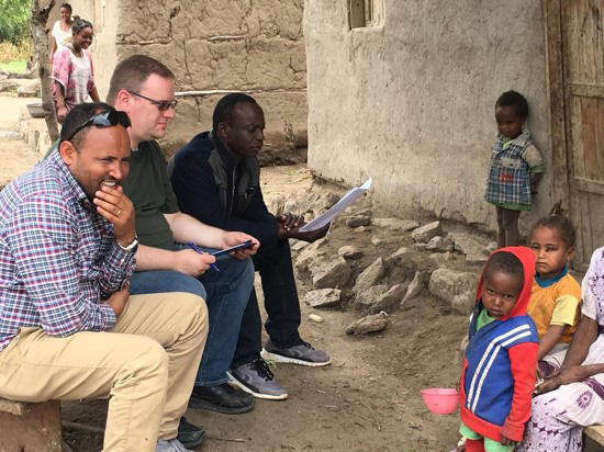 A community home visit in Malawi.