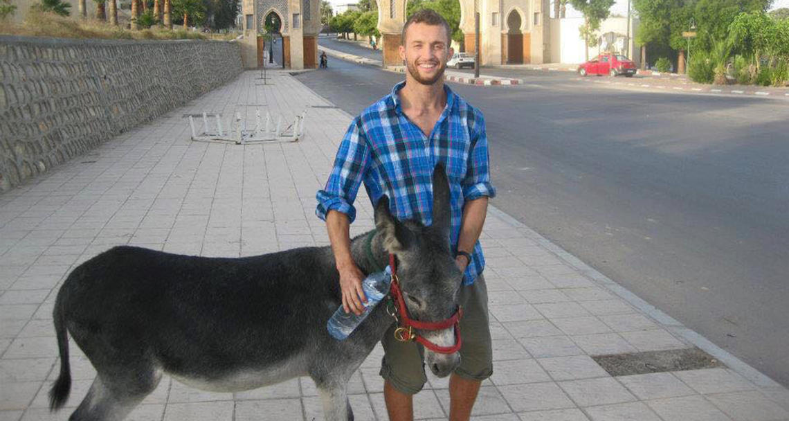 Mooshkeil the donkey and Scott Zaari became fast friends during his summer spent volunteering at the American Fondouk in Fes, Morocco.
