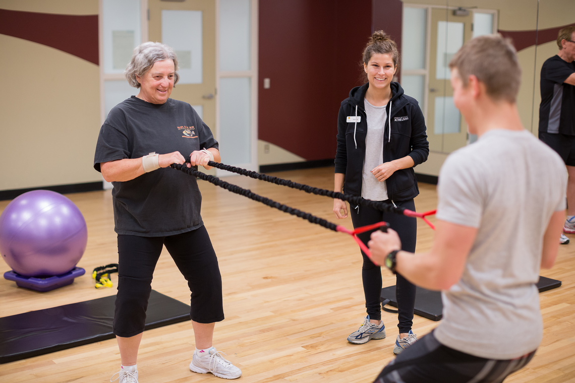 TrymGym participant working out with trainer.