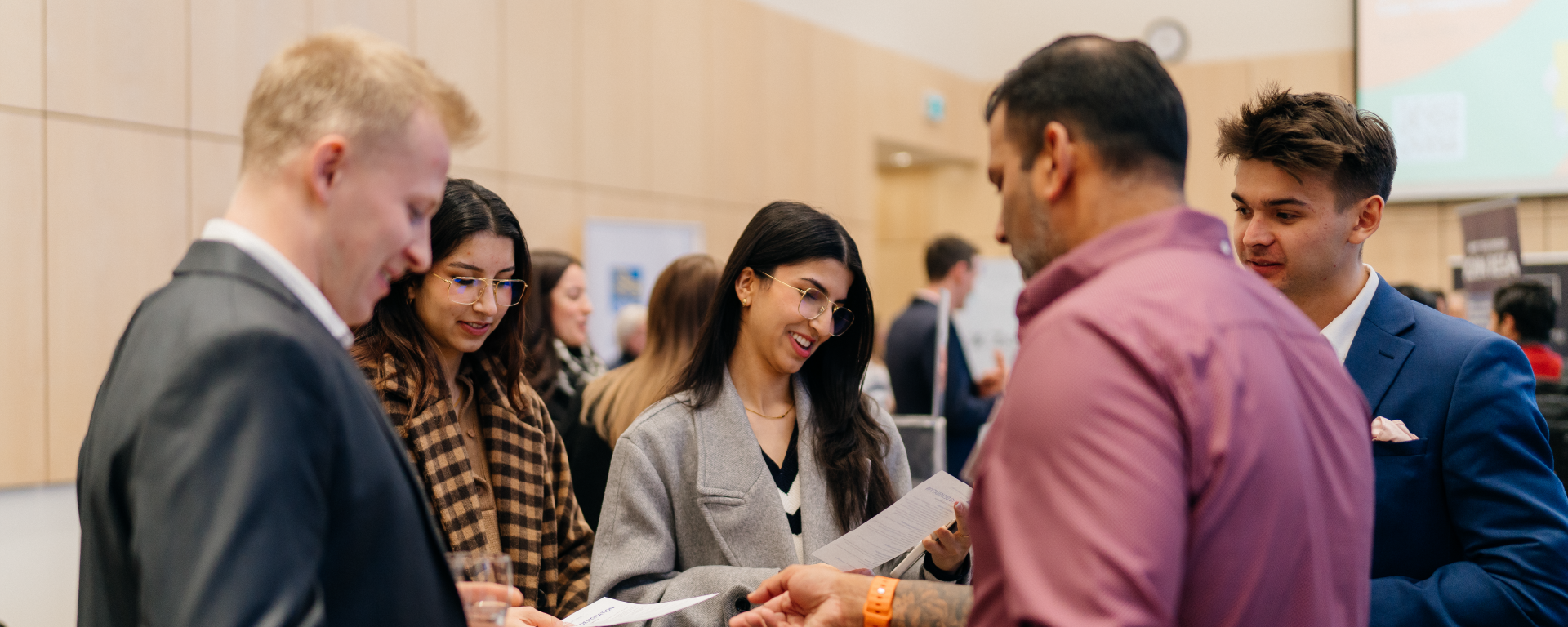Students talking to an employer