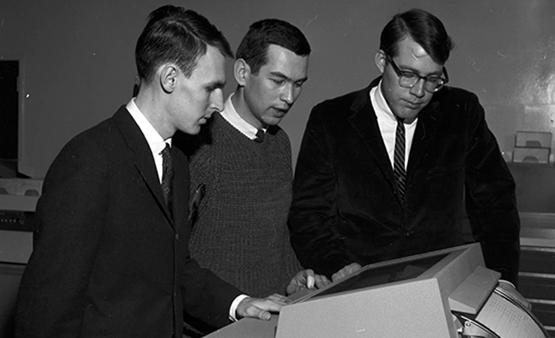 Students in the Faculty of Business playing a computer game, February 1967.