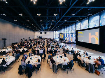 Long shot of the venue with guests seated