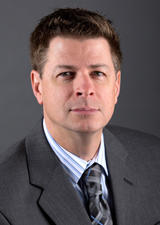 Dr. Derek Hassay