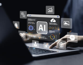 Laptop with artifical screen with the words AI on it. 